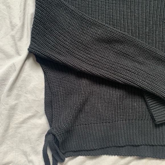 Black knit sweater with slits on the side. Slits tie at the bottom of sides. - Picture 3 of 3